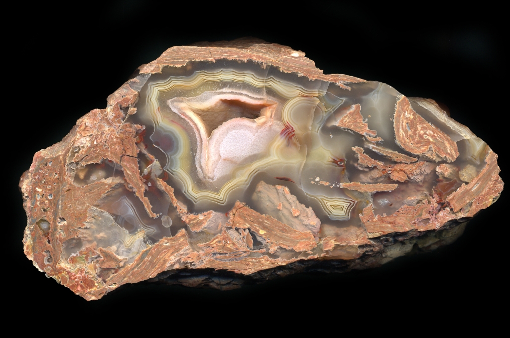 Beautiful Cubuk Russet Thunderegg with Soft Pink Agate