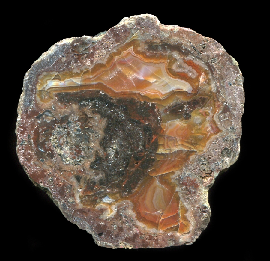 Small and Elegant Köpfchen Thunderegg with Orange Agate