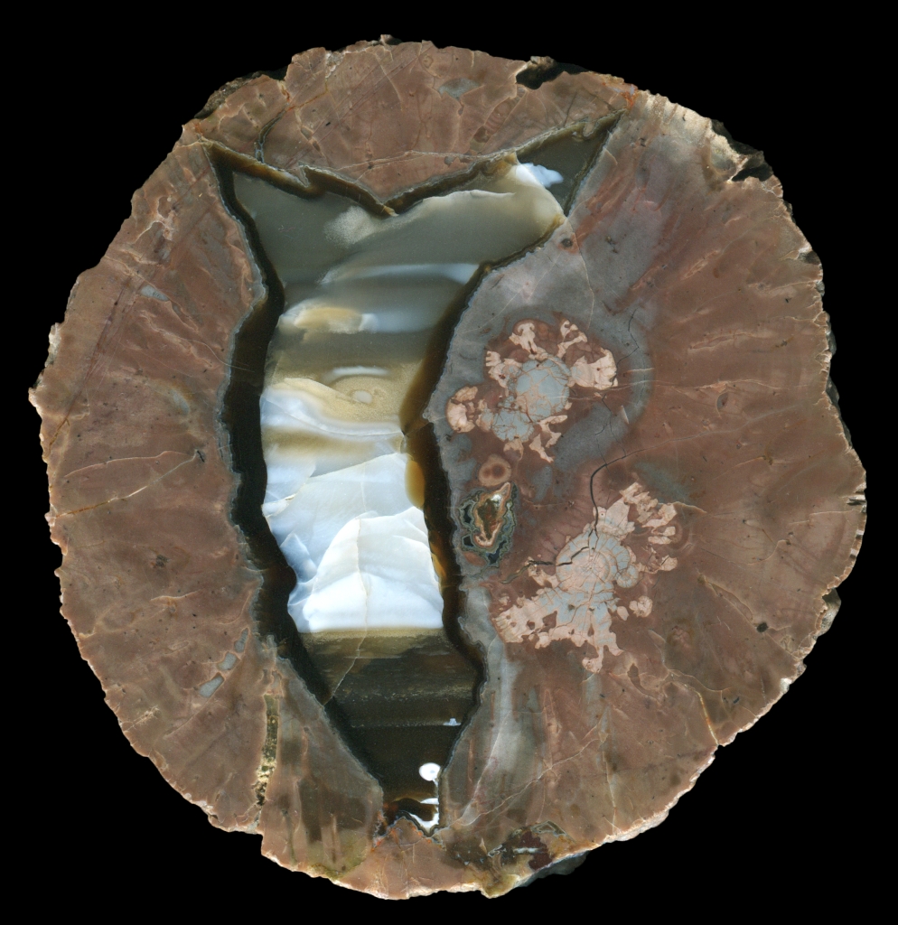 Beautiful Karadana Thunderegg with Reddish Matrix and Opal 
